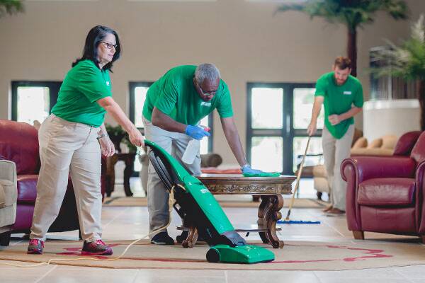 commercial cleaning team working a hotel lobby