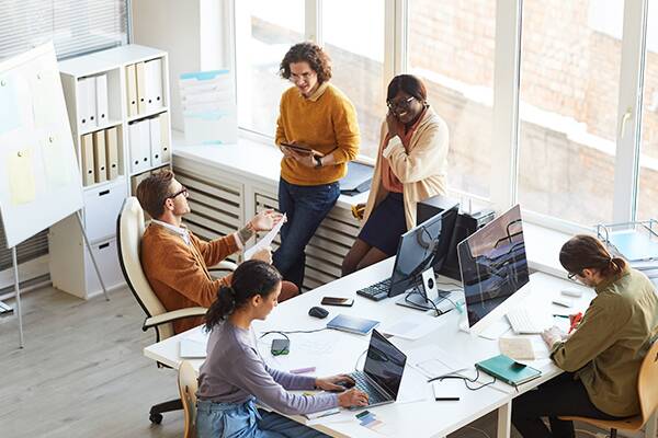 Office employees enjoying the benefits of a clean work environment