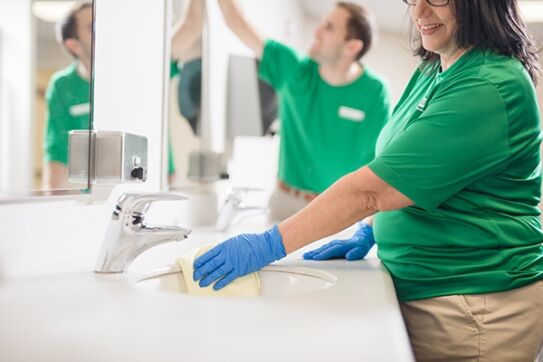 janitor team following cleaning industry best practices