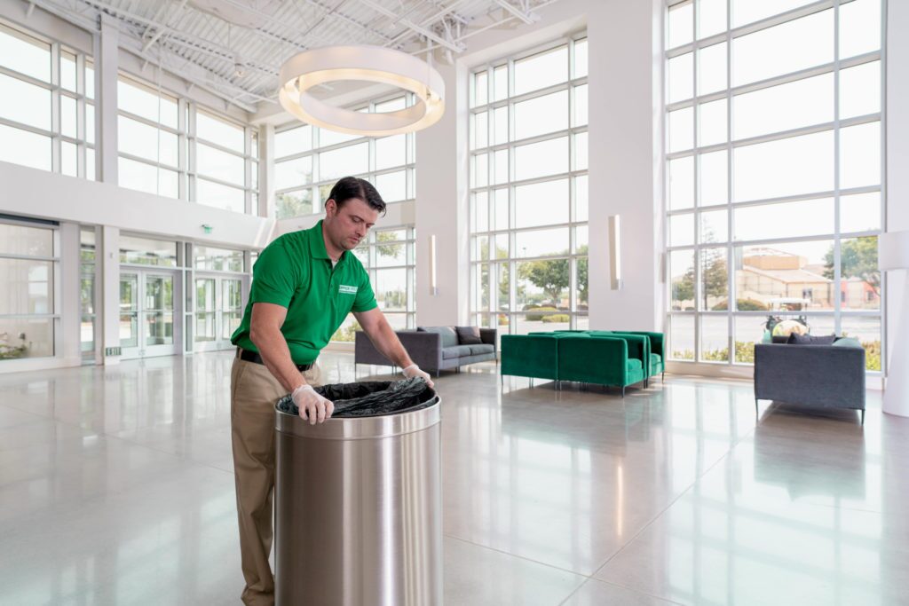 commercial cleaning professional conducting a cleaning visit