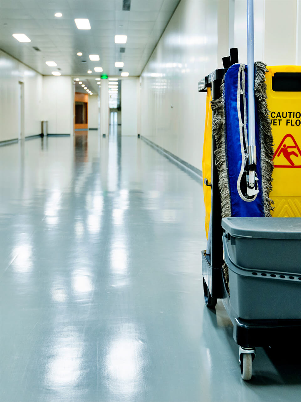 janitor cart in hallway of commercial building