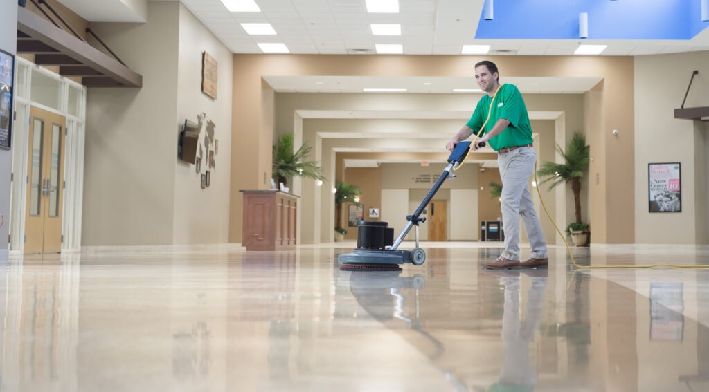 commercial sweeper being used in office building between offices