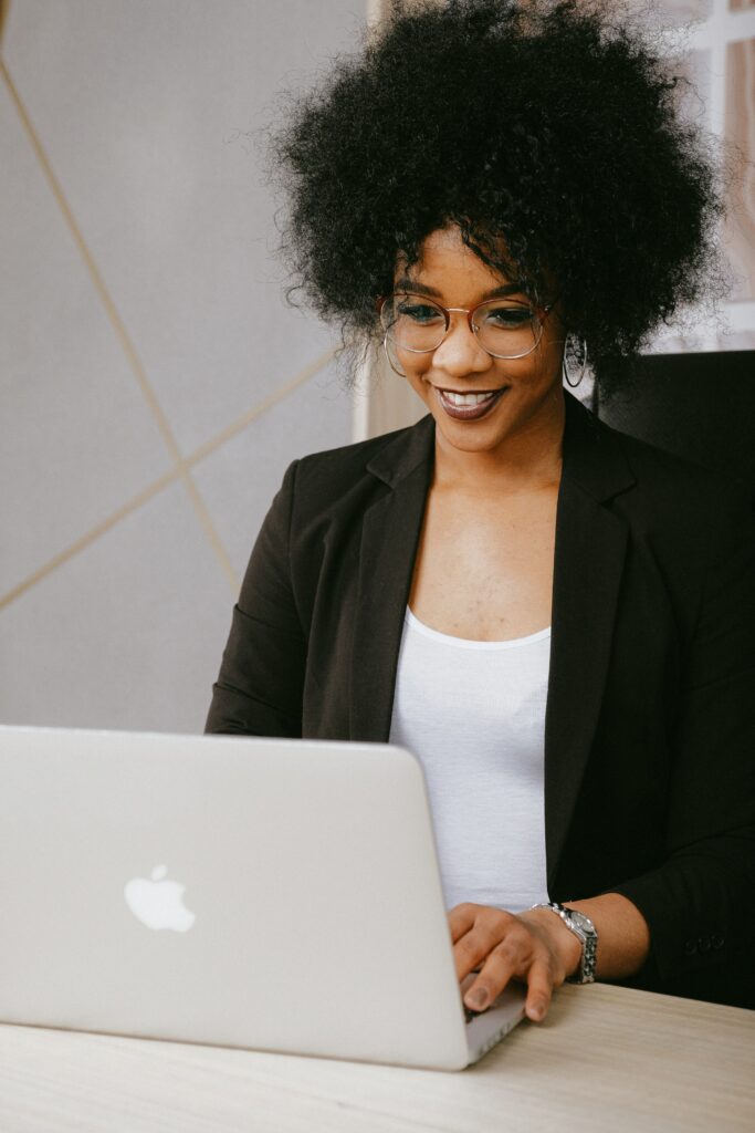 office employee using laptop computer