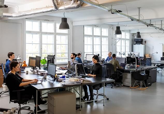 commercially cleaned co-working office space full of employees